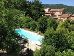 Transats au bord de la piscine 12x5m — Les Raspes, Aveyron